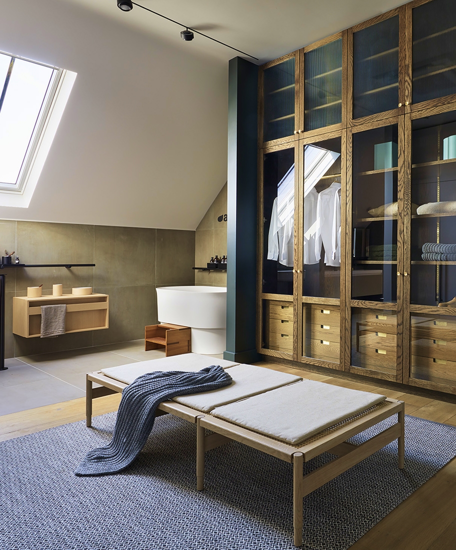 A dressing room with a plunge pool in the corner