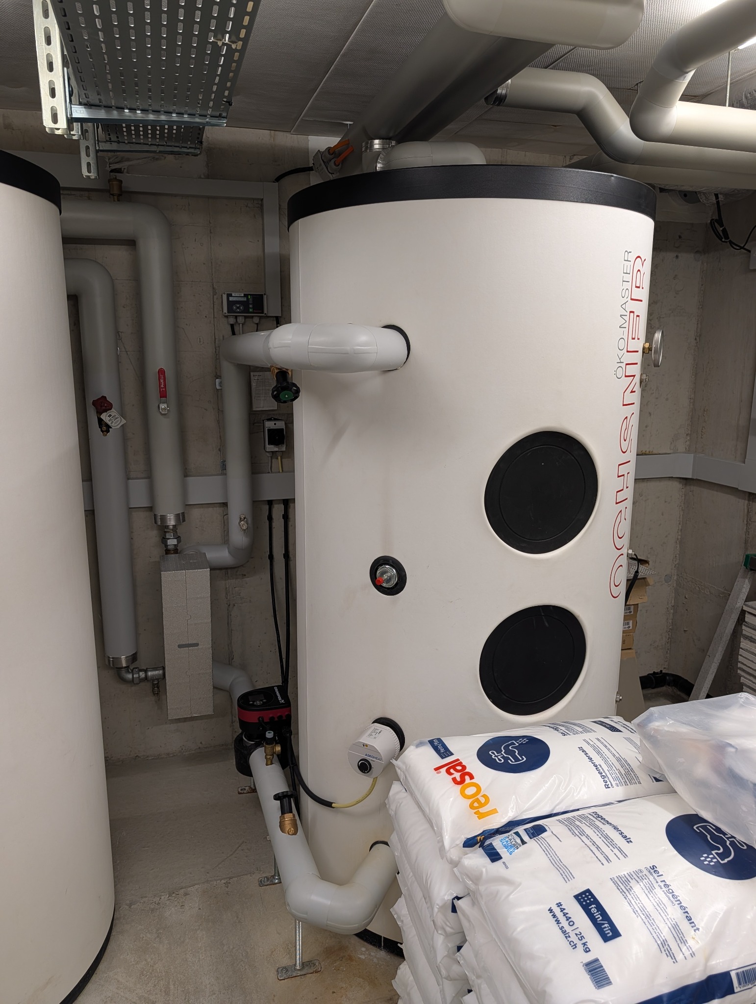 Storage tanks and hydronics of the repaired heat pump system