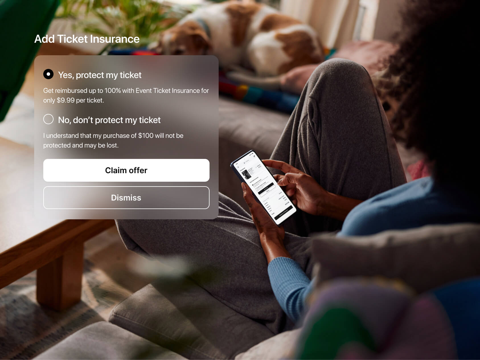 A woman lounges on a cozy couch in loungewear, browsing her phone. A UI prompt offers event ticket insurance for $9.99, with two options: “Yes, protect my ticket” or “No, don’t protect my ticket,” highlighting the potential loss of a $100 ticket if declined. A dog sleeps in the background.
