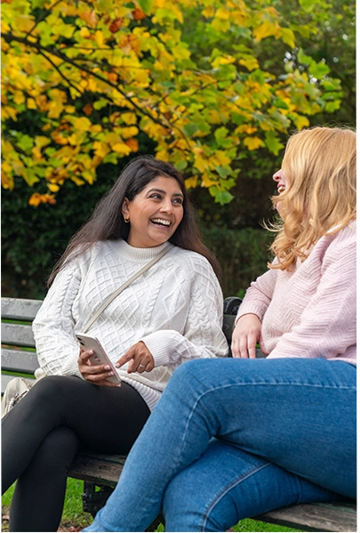 Two friends discussing weight loss benefits from SheMed