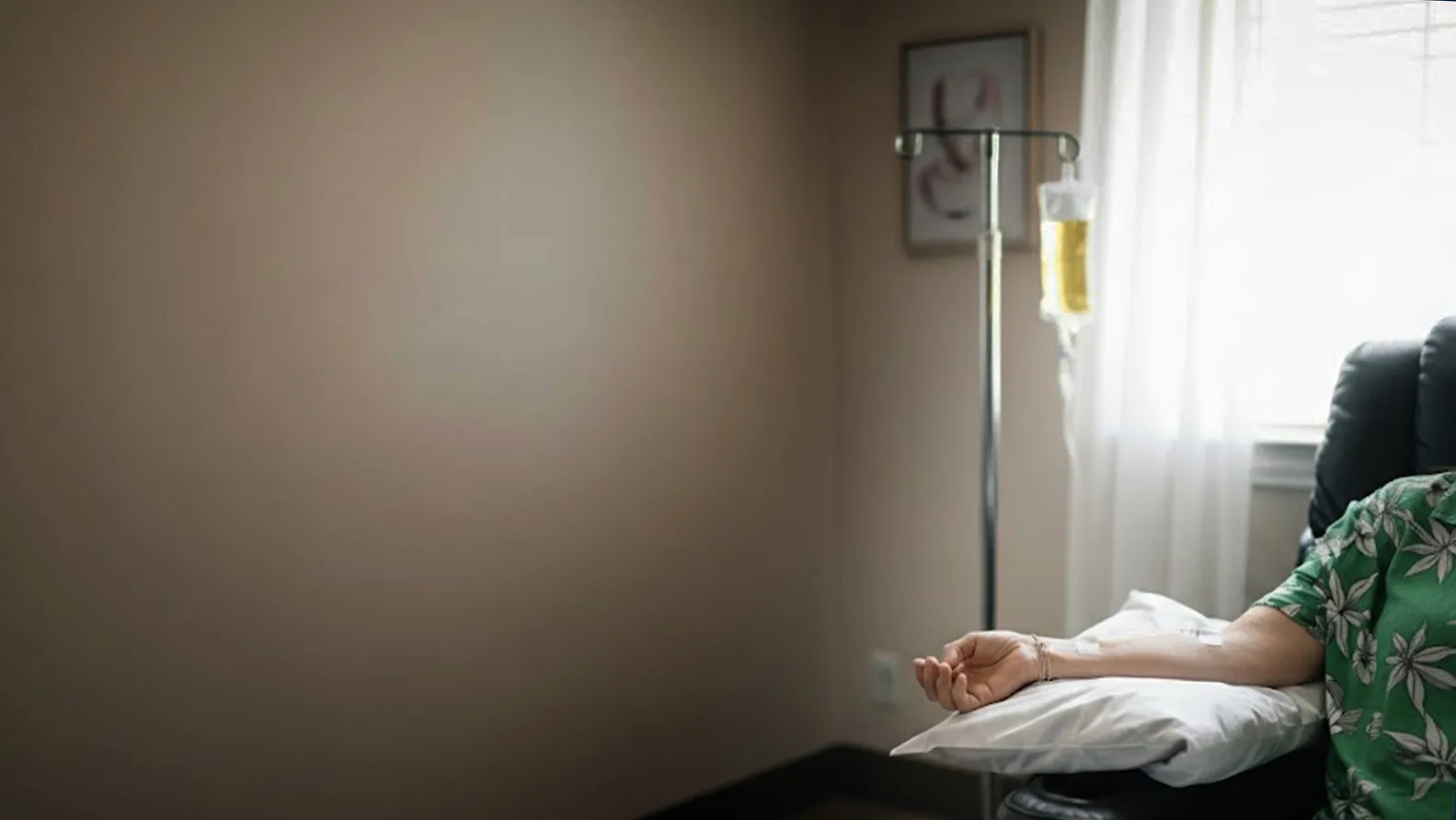 A woman sitting in a chair in a room of Innovate Health Door Grapevine TX