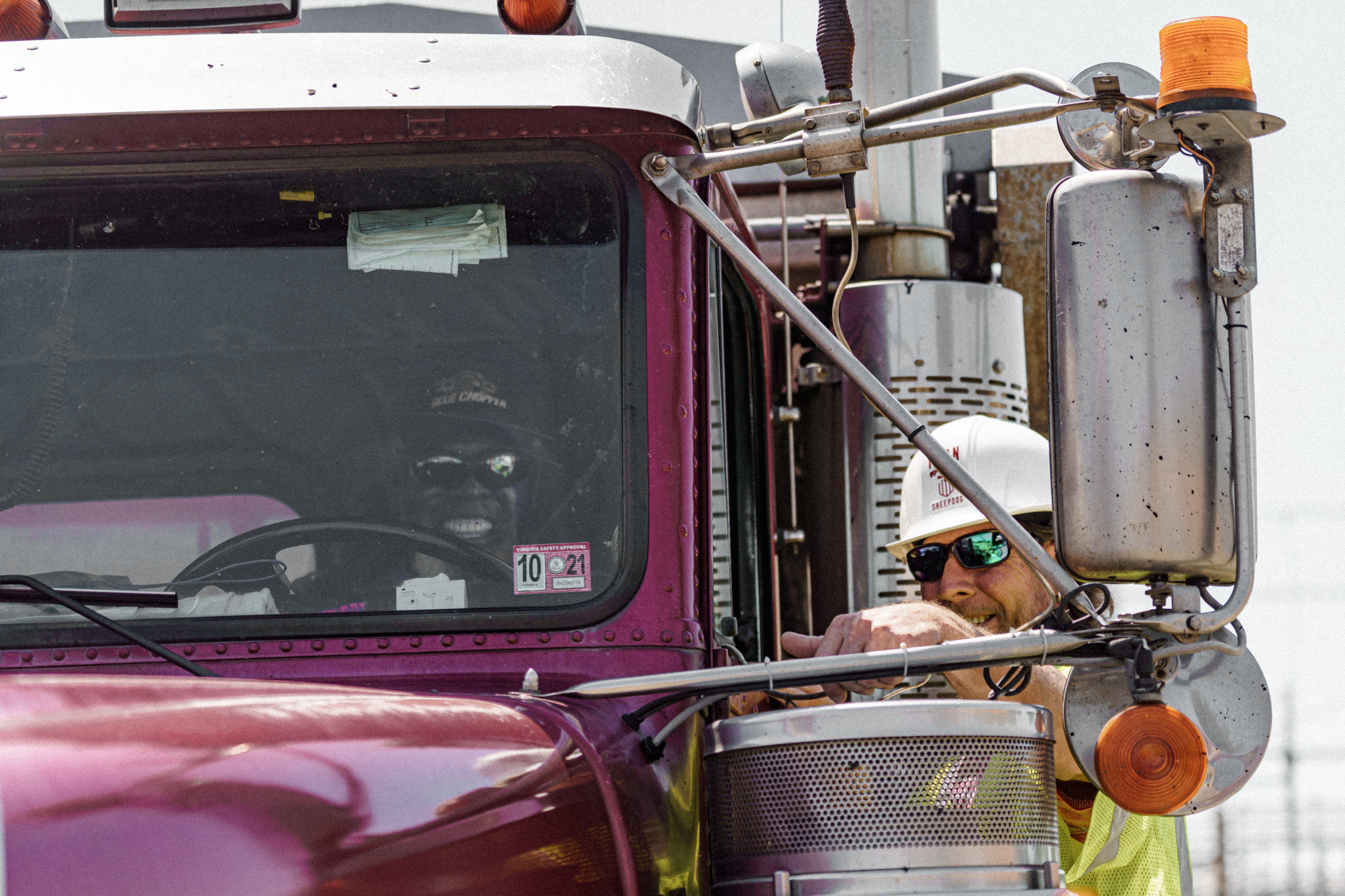 Hauler in the cab of a dump truck