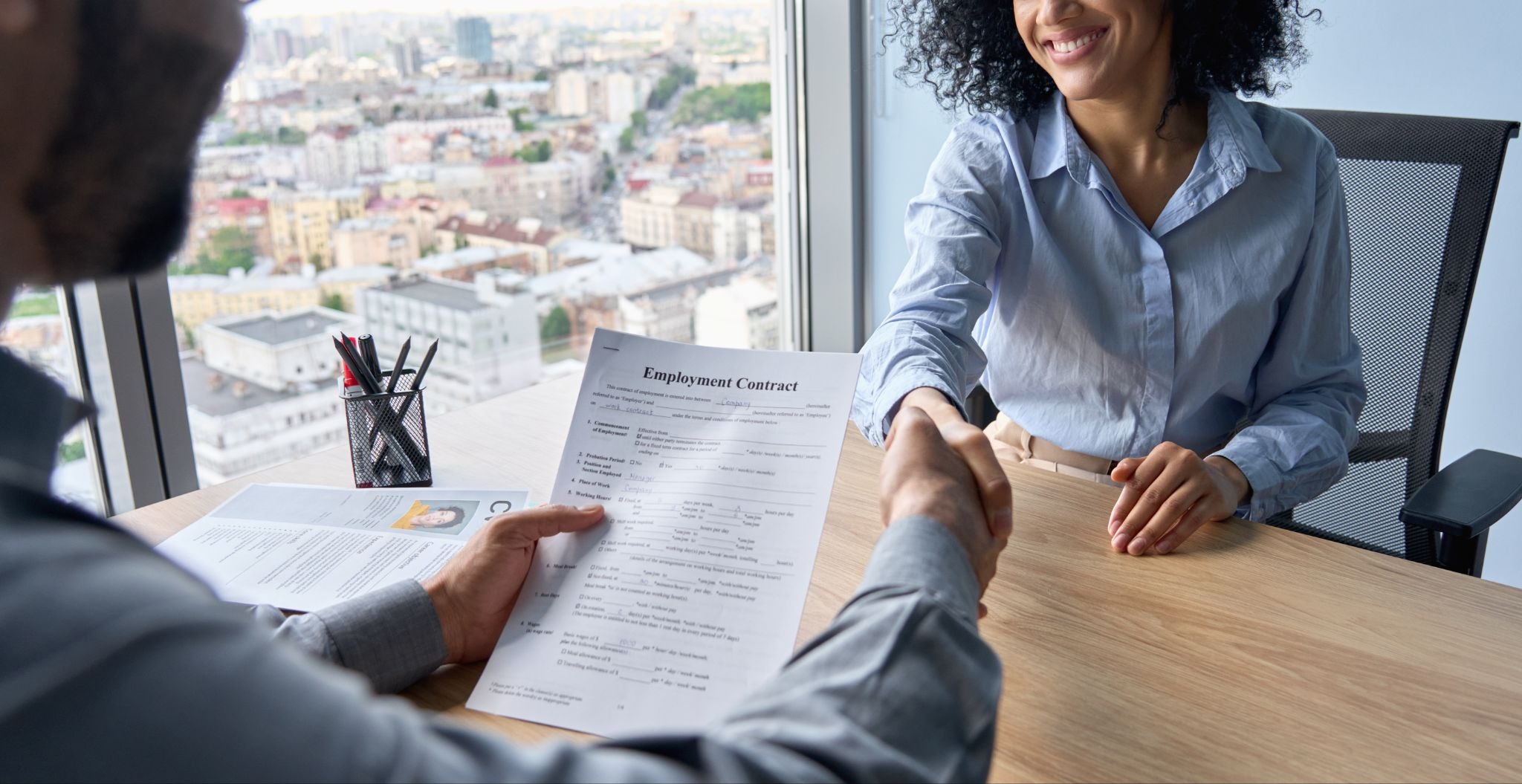 woman hiring new employee for her small business