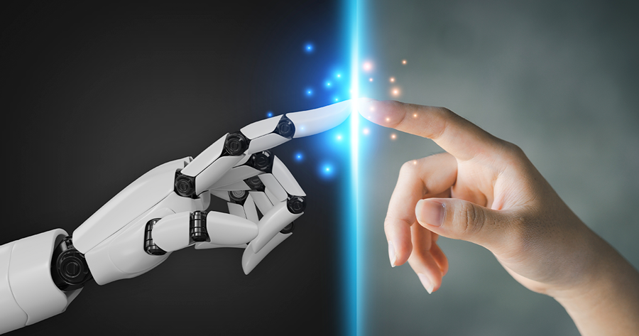 Human and robot hand connecting to represent the connection between humans and AI
