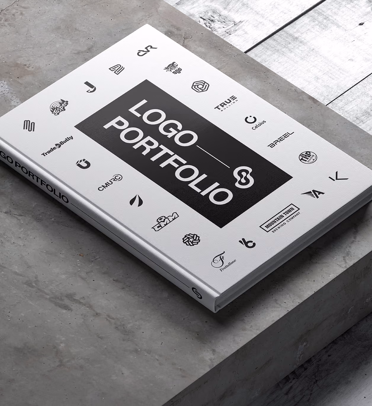 Hardcover book showcasing a collection of logos and marks from the Logo Portfolio.
