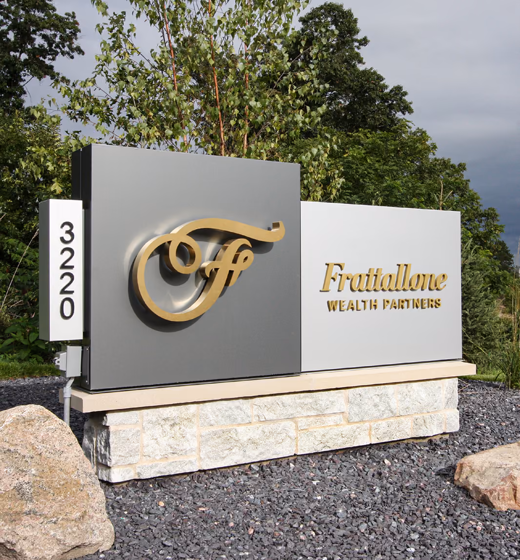 Frattallone Wealth Partners branded monument sign outside the office.
