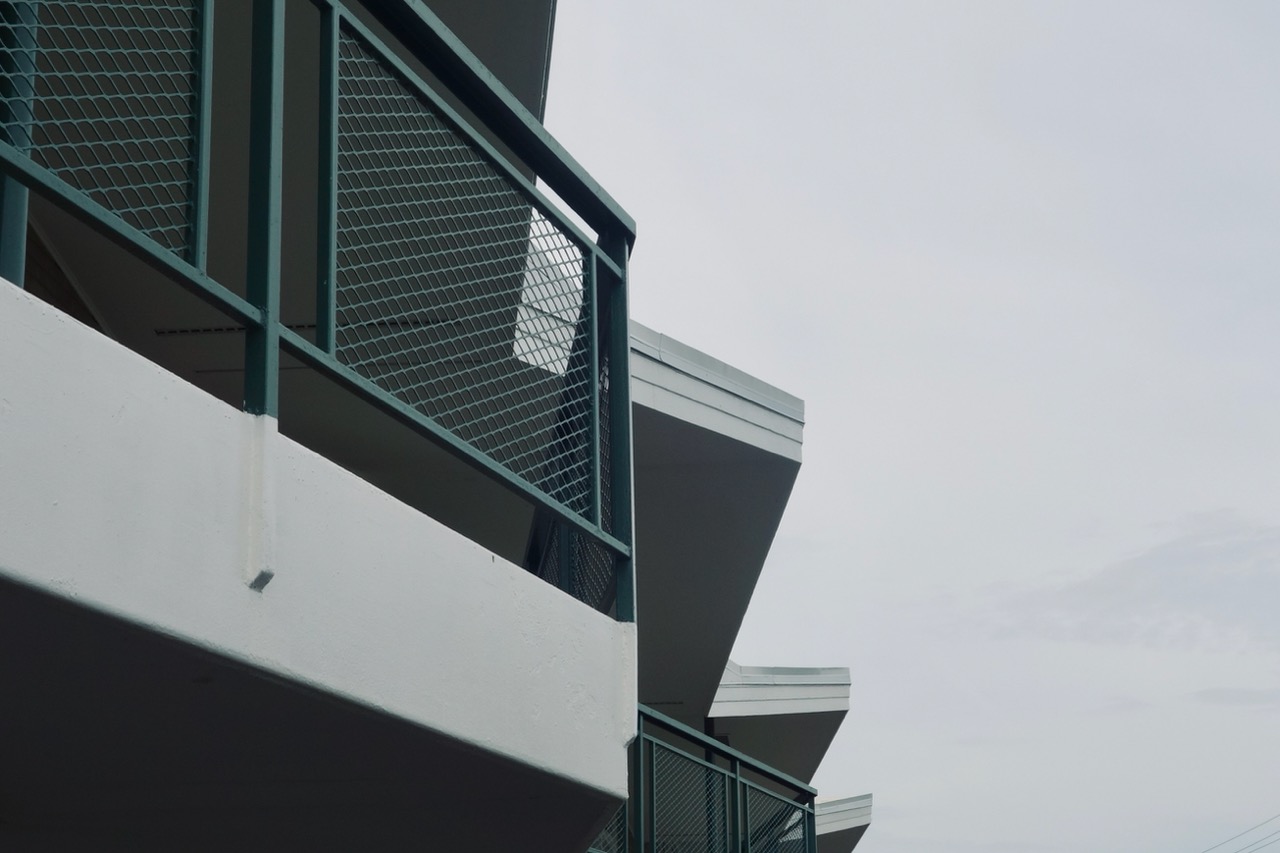 Exterior balcony and googie-style roofline
