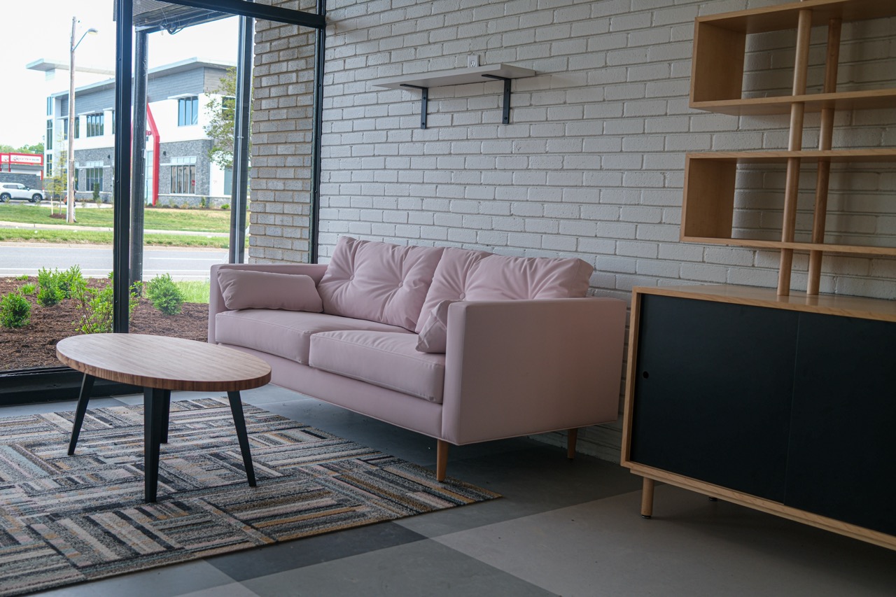 Lobby seating area with sofa and coffee table