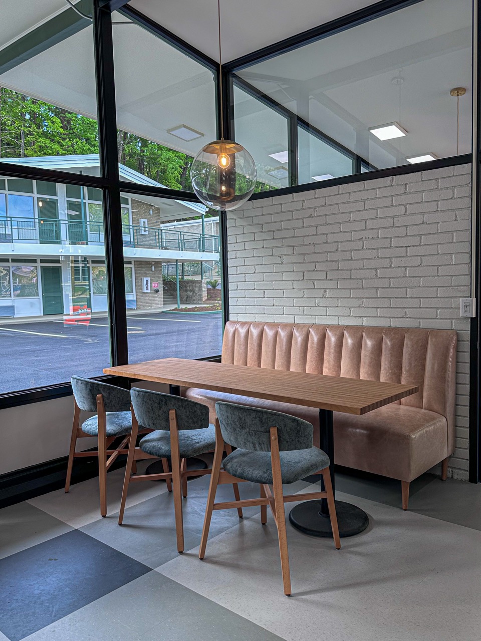 Lobby seating area with booth and chairs
