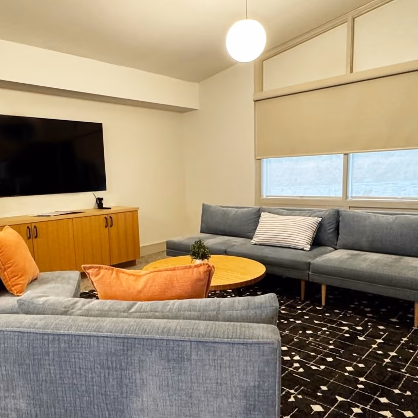 Inviting hospitality space with multiple sofas ideal for gatherings and casual meetings.