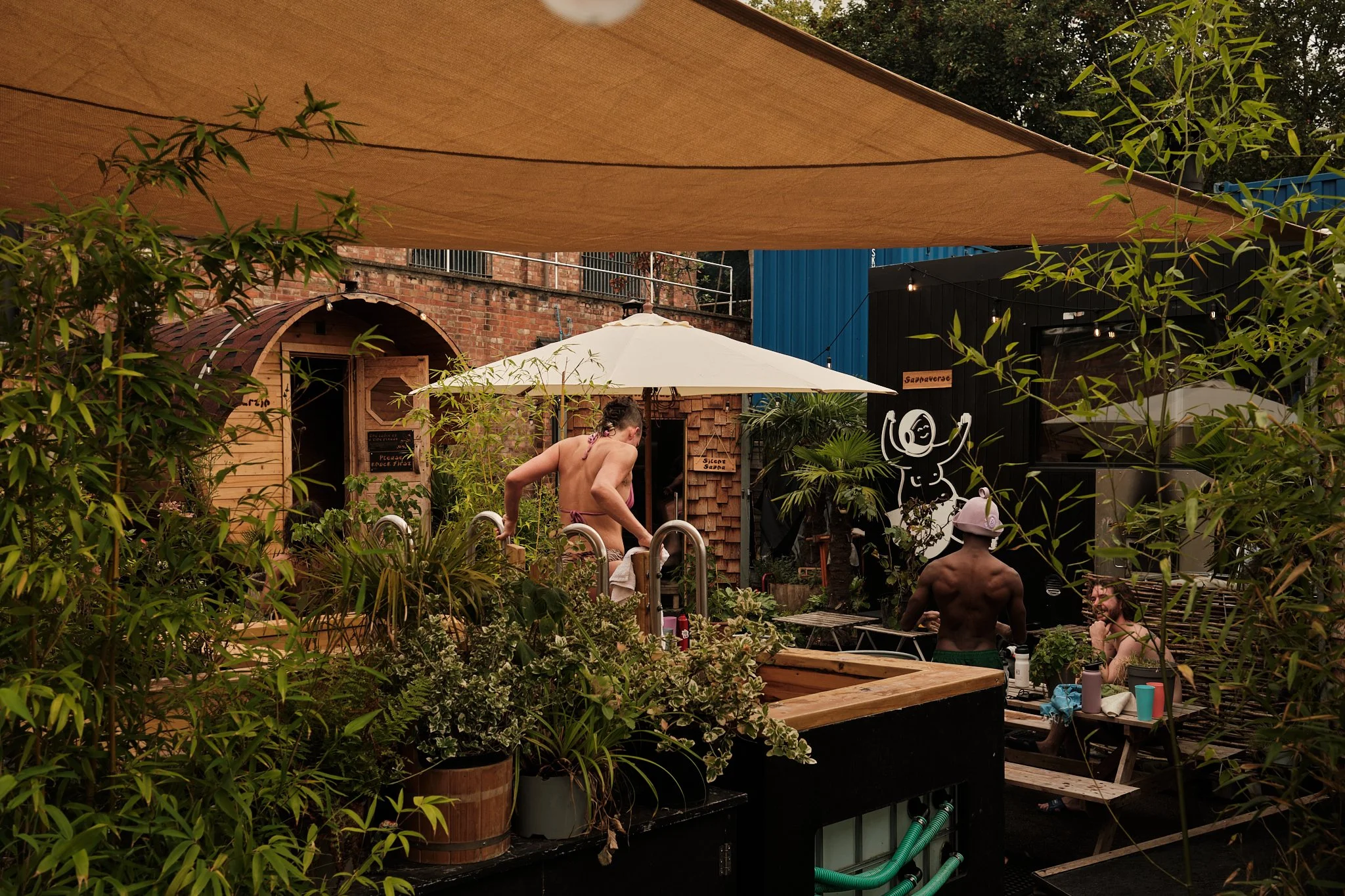 Two women in professional attire, illustrating the concept of following fashion trends for 2025.