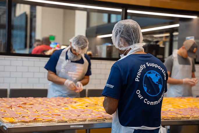 PenFed volunteers distributing supplies