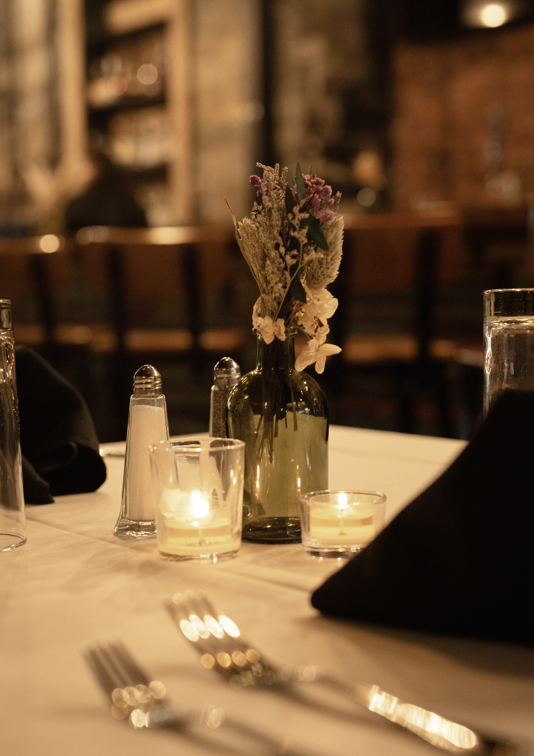 [background image] image of restaurant exterior at night (for a fine dining restaurant).