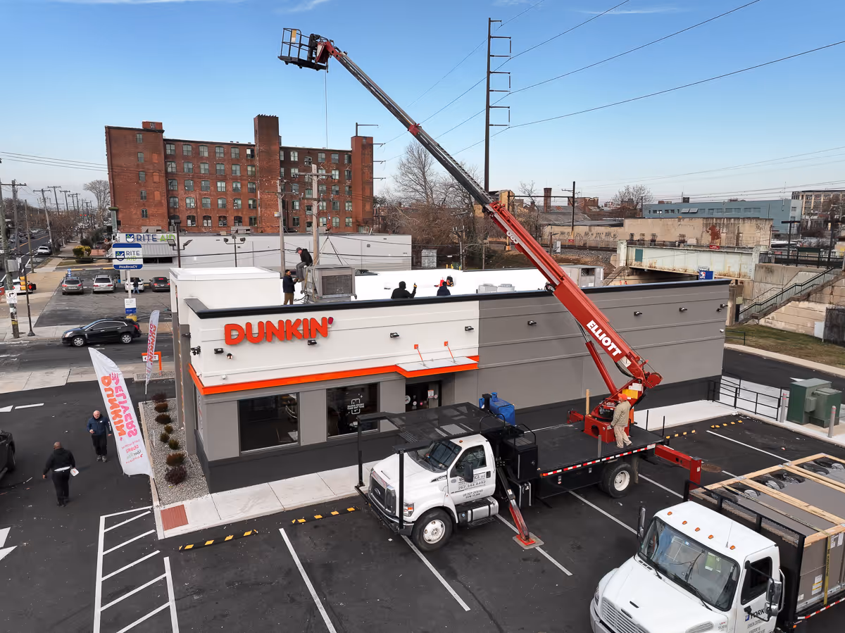 A drone photography shot of a roof top AC unit install by Polar Mechanical.