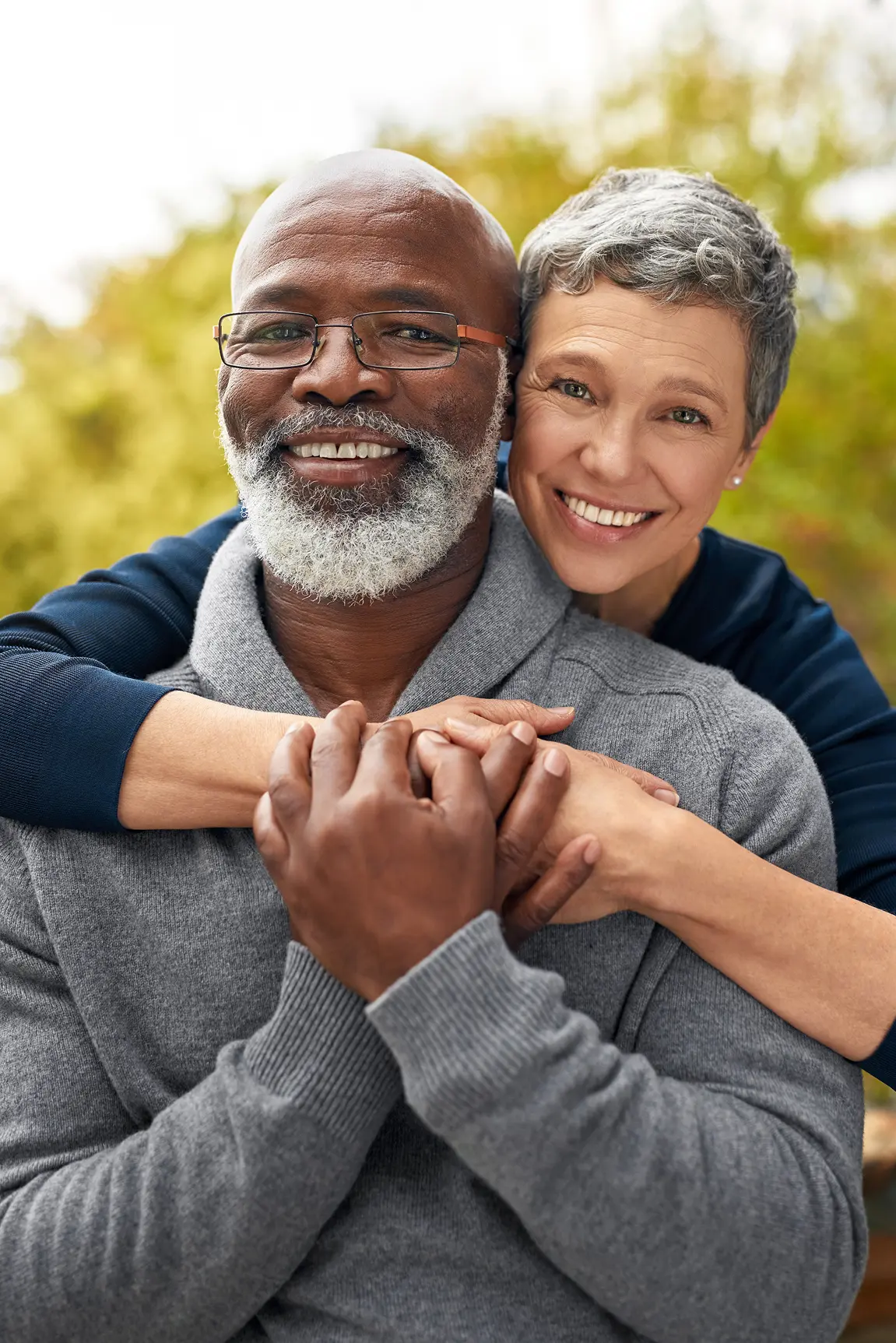 A man and a woman holding each other.