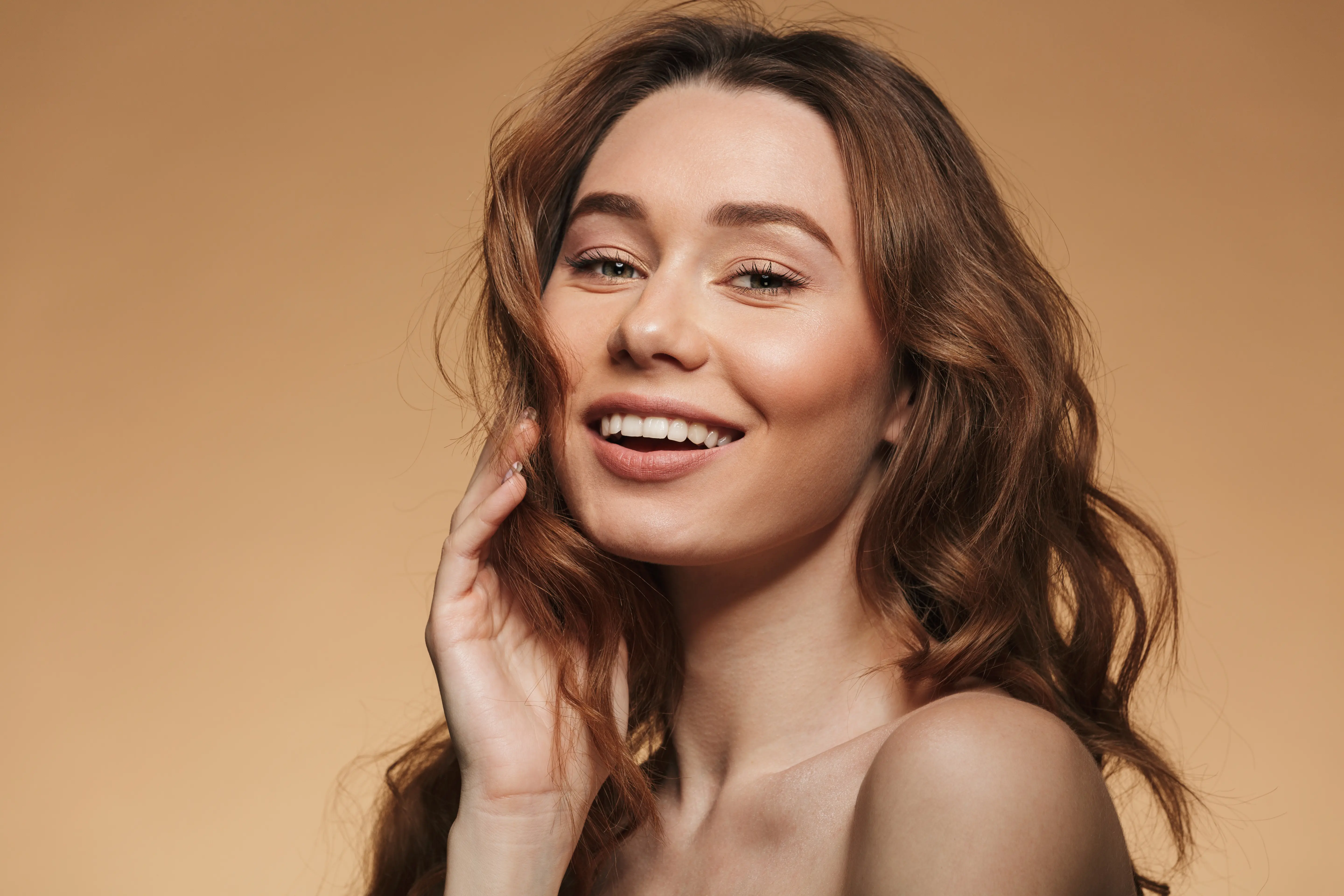 A woman with a smile on her face.