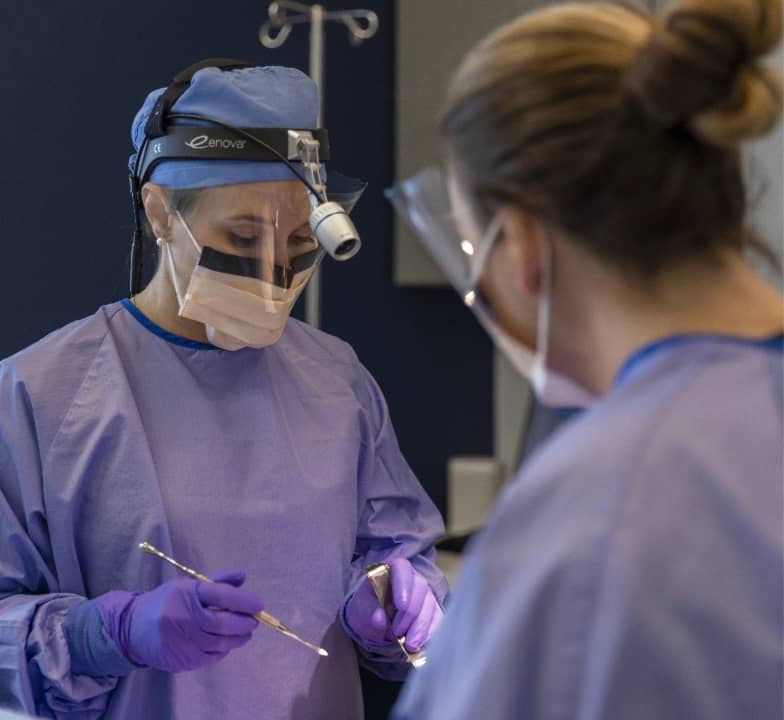 arvada tooth extraction surgeons mid procedure at avos dental specialists