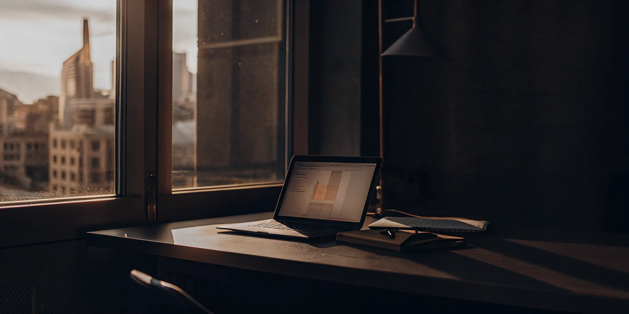 Comparing PEO companies on a laptop to find the best service for a business.