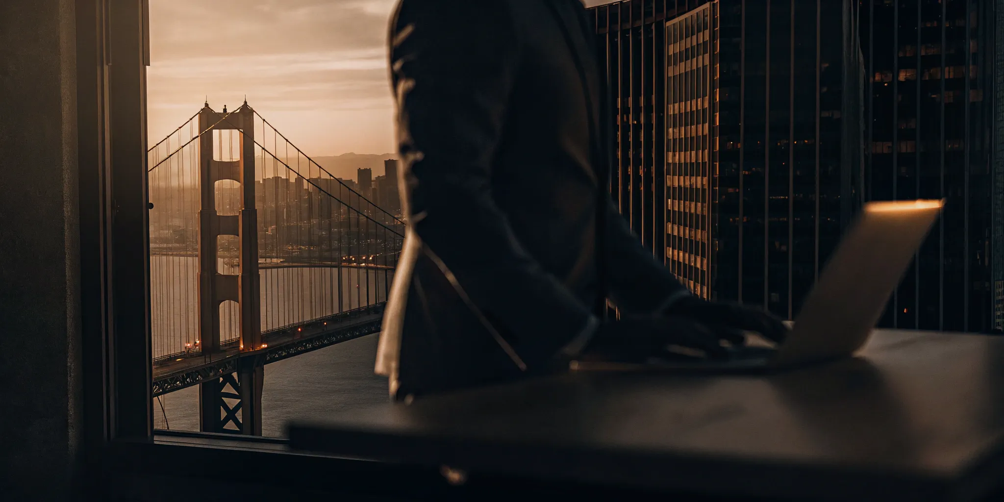 Business manager using a laptop to compare the best PEO companies in 2025.