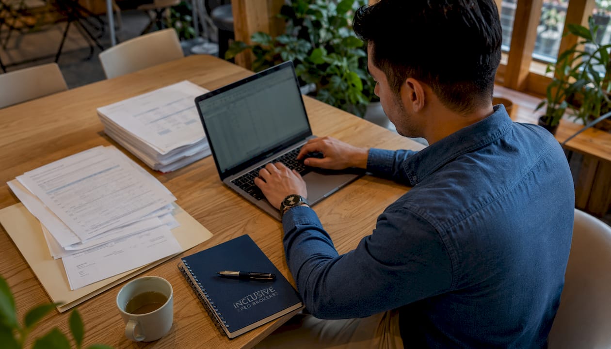 HR coordinator working on payroll in office