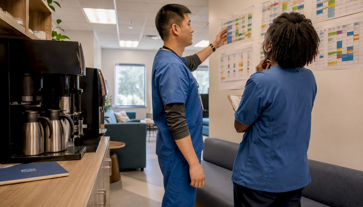 Healthcare staff discussing schedules in clinic