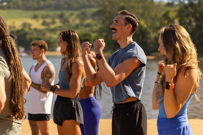 A group of contestants wearing Samsung Galaxy Watch Ultra smart watches.