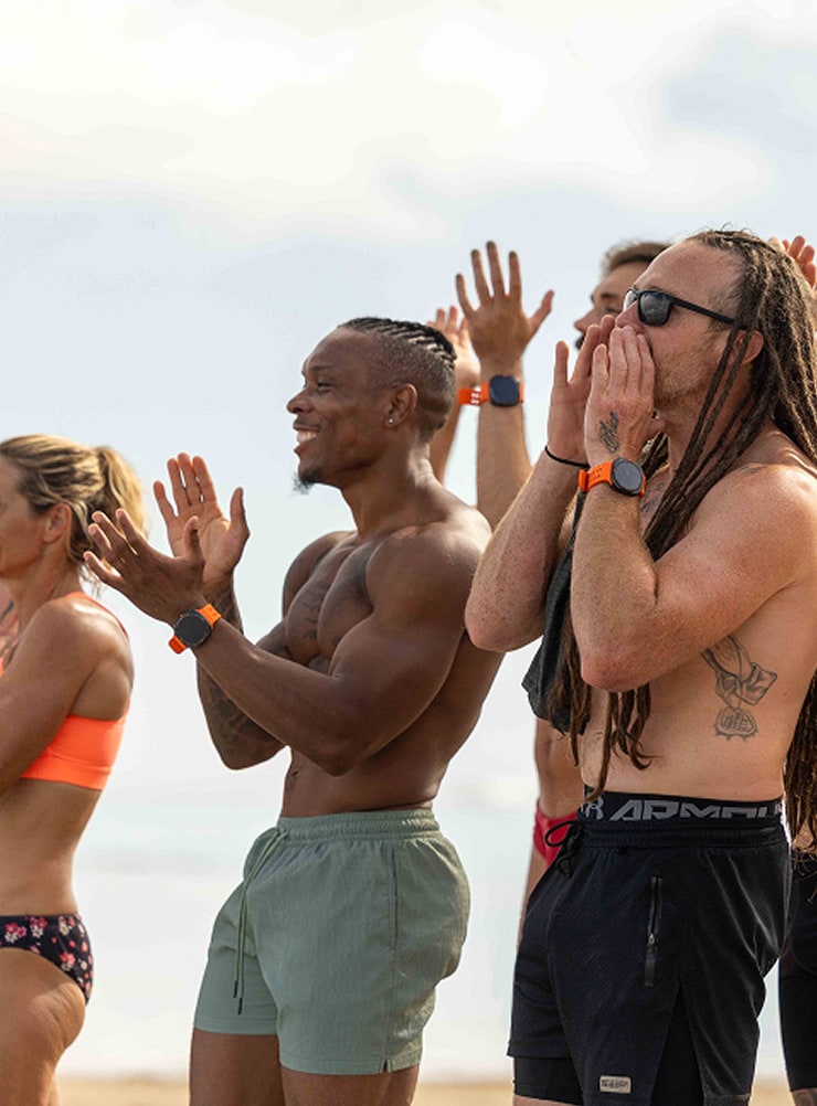 Contestestants celebrate while listening to music on the iHeartRadio platform.