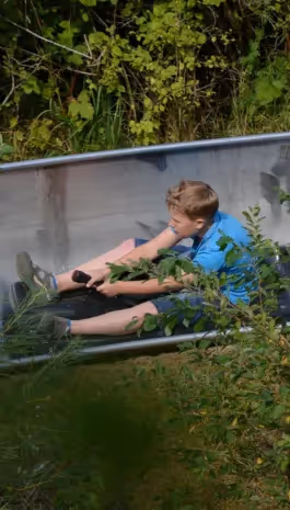 Luge d'été à Combloux, activité familiale dans les Alpes françaises avec vue sur le Mont-Blanc.