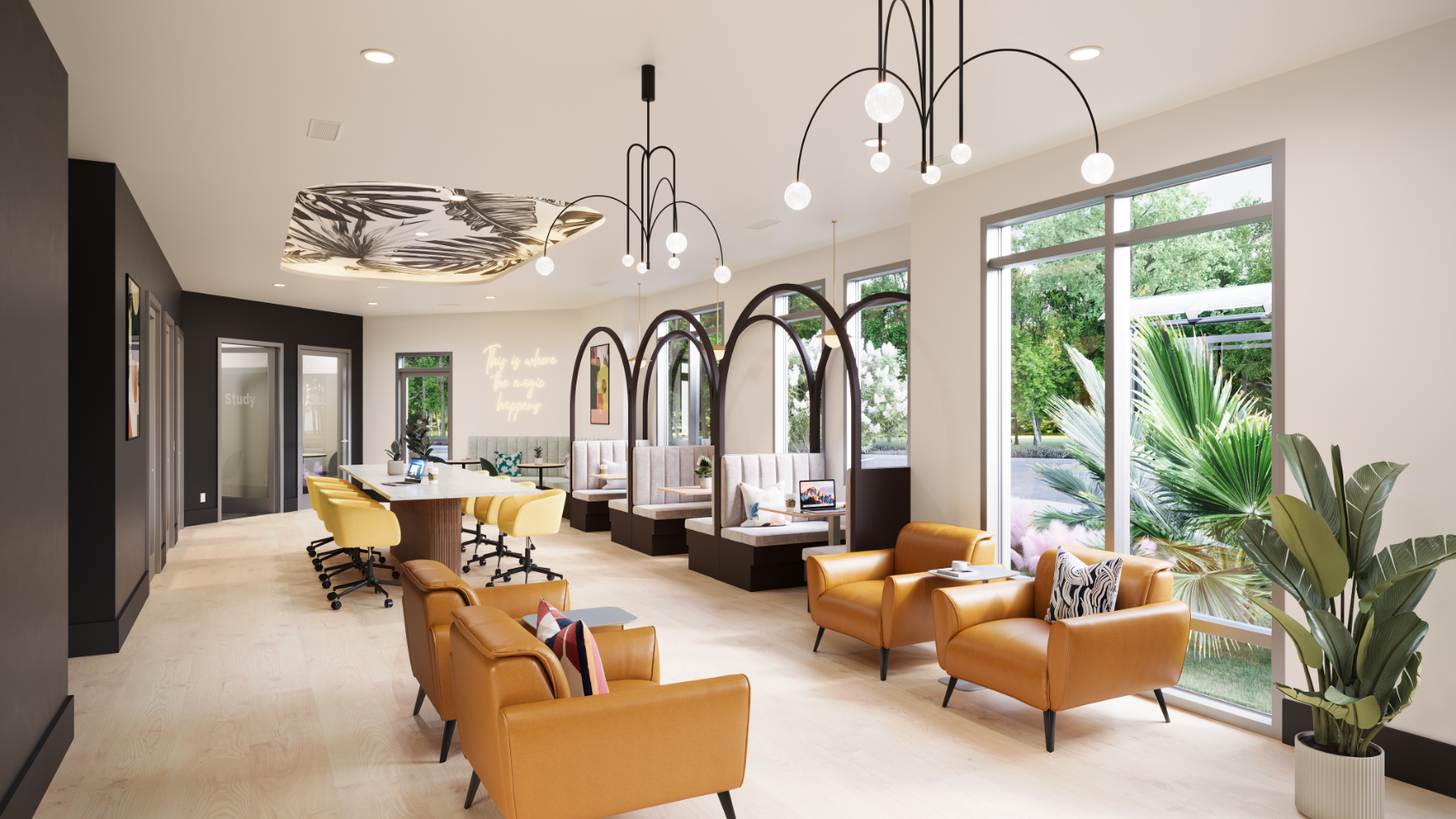 Spacious co-working lounge with individual study nooks, communal tables, and comfortable chairs, showcasing a resident amenity at The Rook in Orlando, FL.