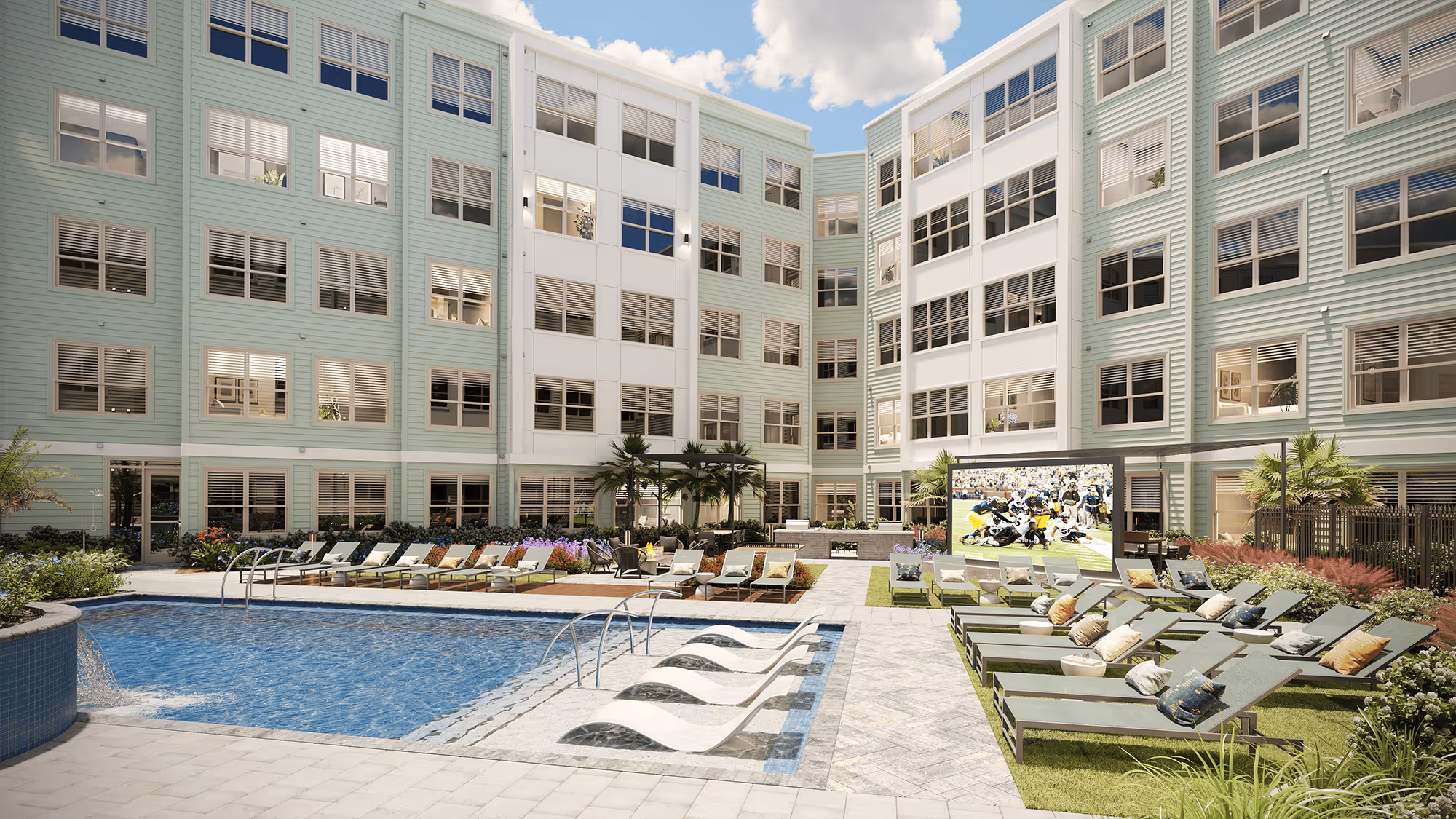 Courtyard swimming pool with lounge chairs and a large outdoor TV screen, surrounded by the modern residential buildings at The Rook in Orlando, FL.