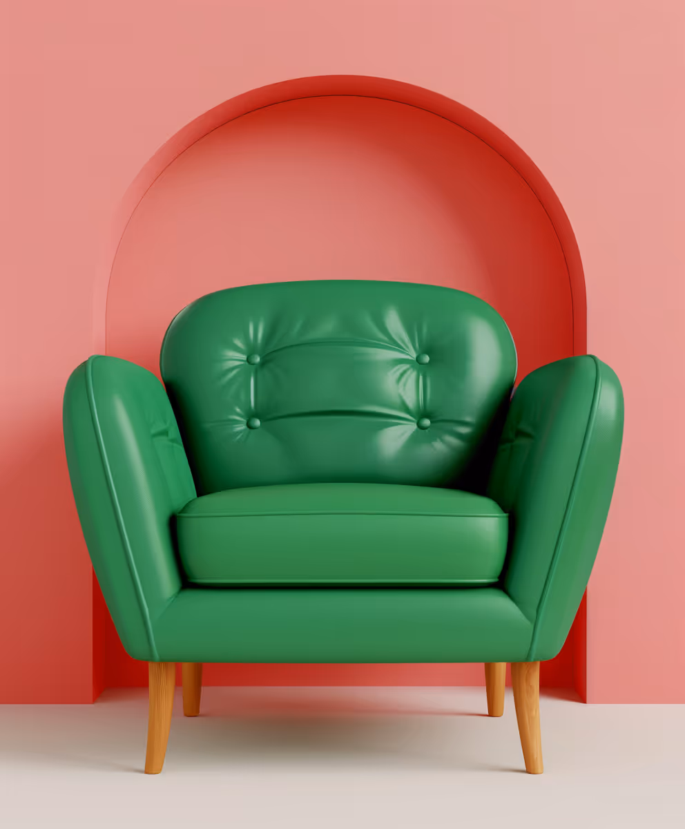 Stylish Green Armchair Against Red and Pink Background