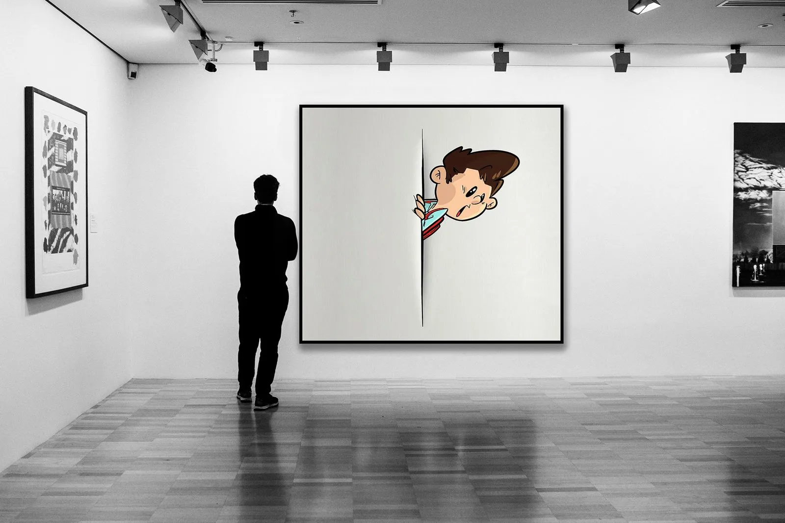 A person in an art gallery observing a large artwork featuring a cartoon character peeking through a crack