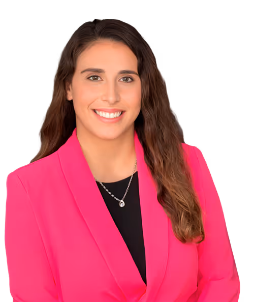 Portrait of Jessica Abdollahi wearing a pink blazer, experienced Sacramento family law attorney.
