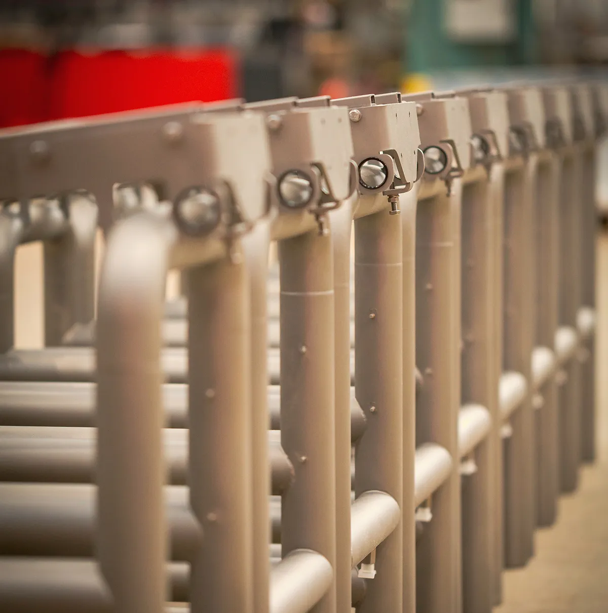 A row of white pipes sitting next to each other.