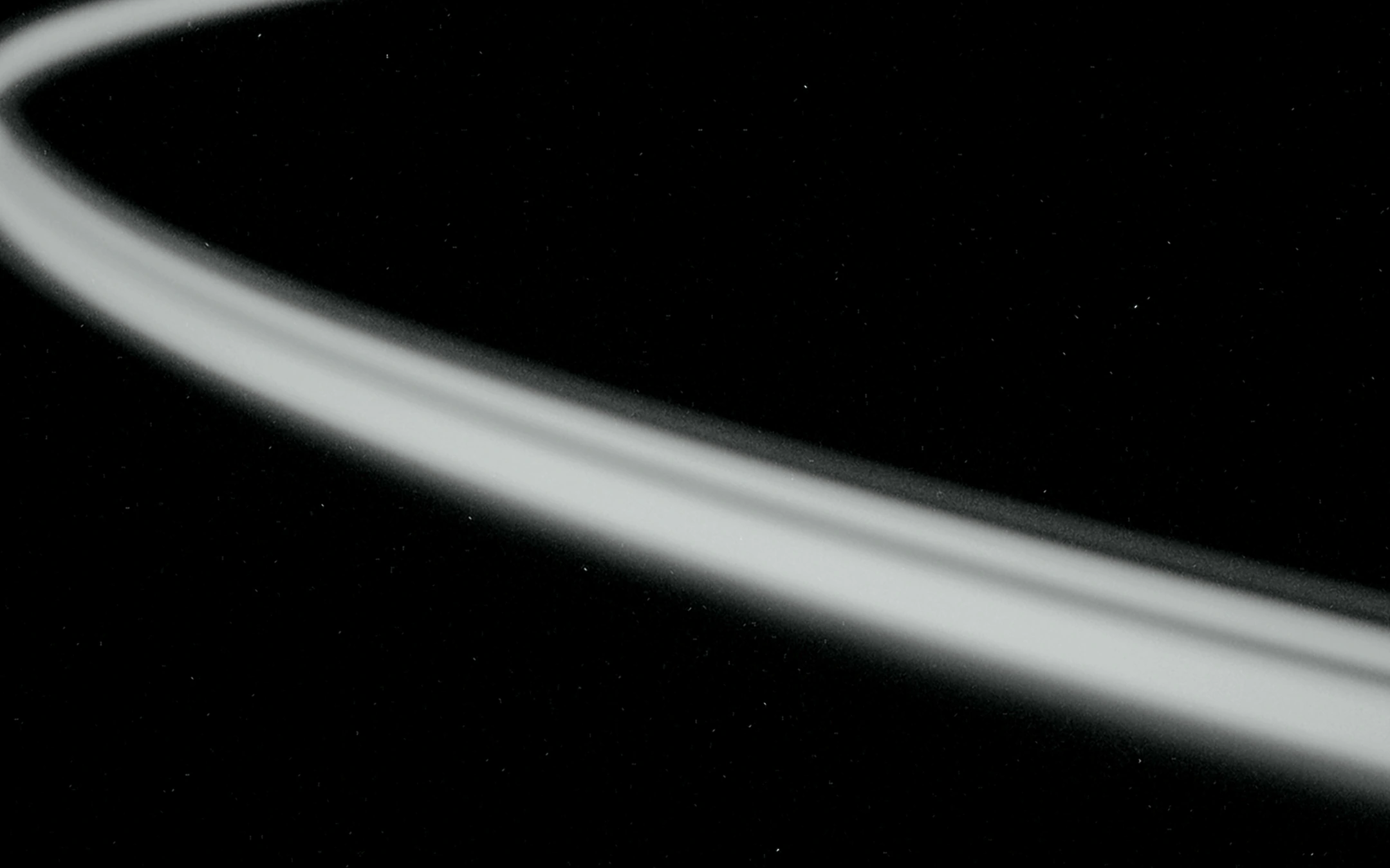 Long-exposure light arc tracing a lap, LAPS by Dominik Leingartner, produced by Studio ONOM