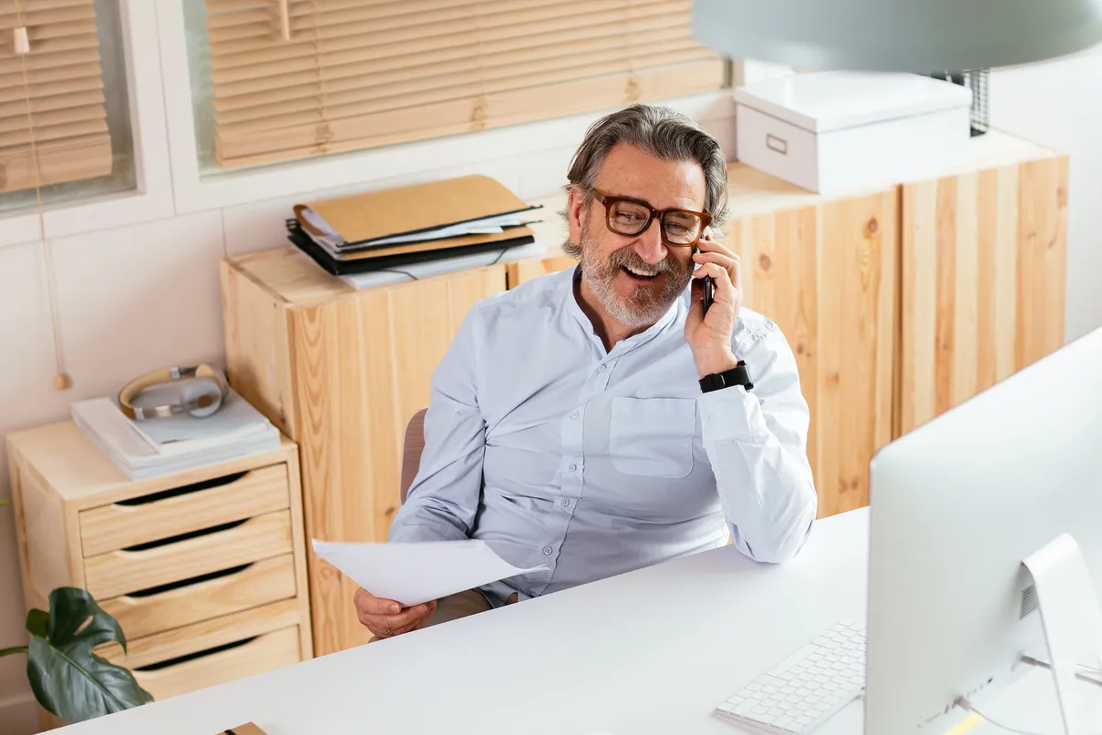 Man on the phone getting product info from AI agent