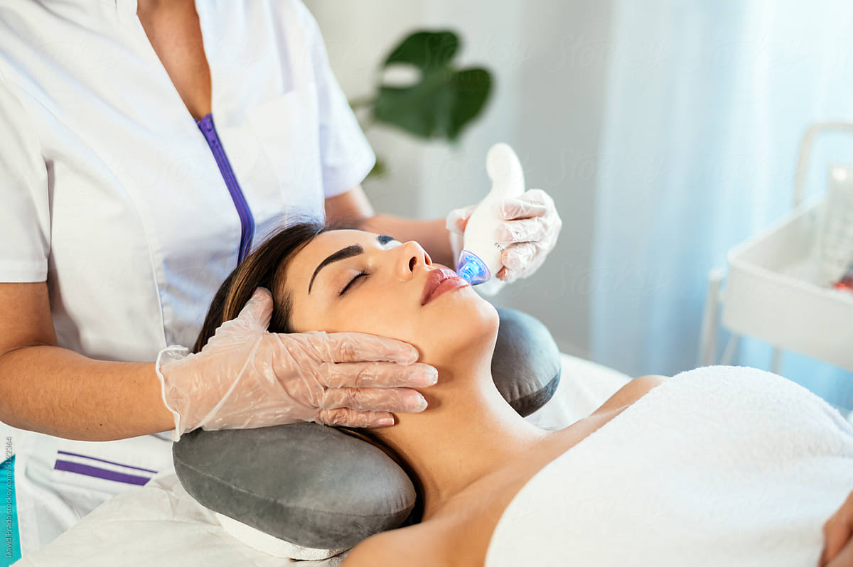 Couple shaking hands with financial advisor