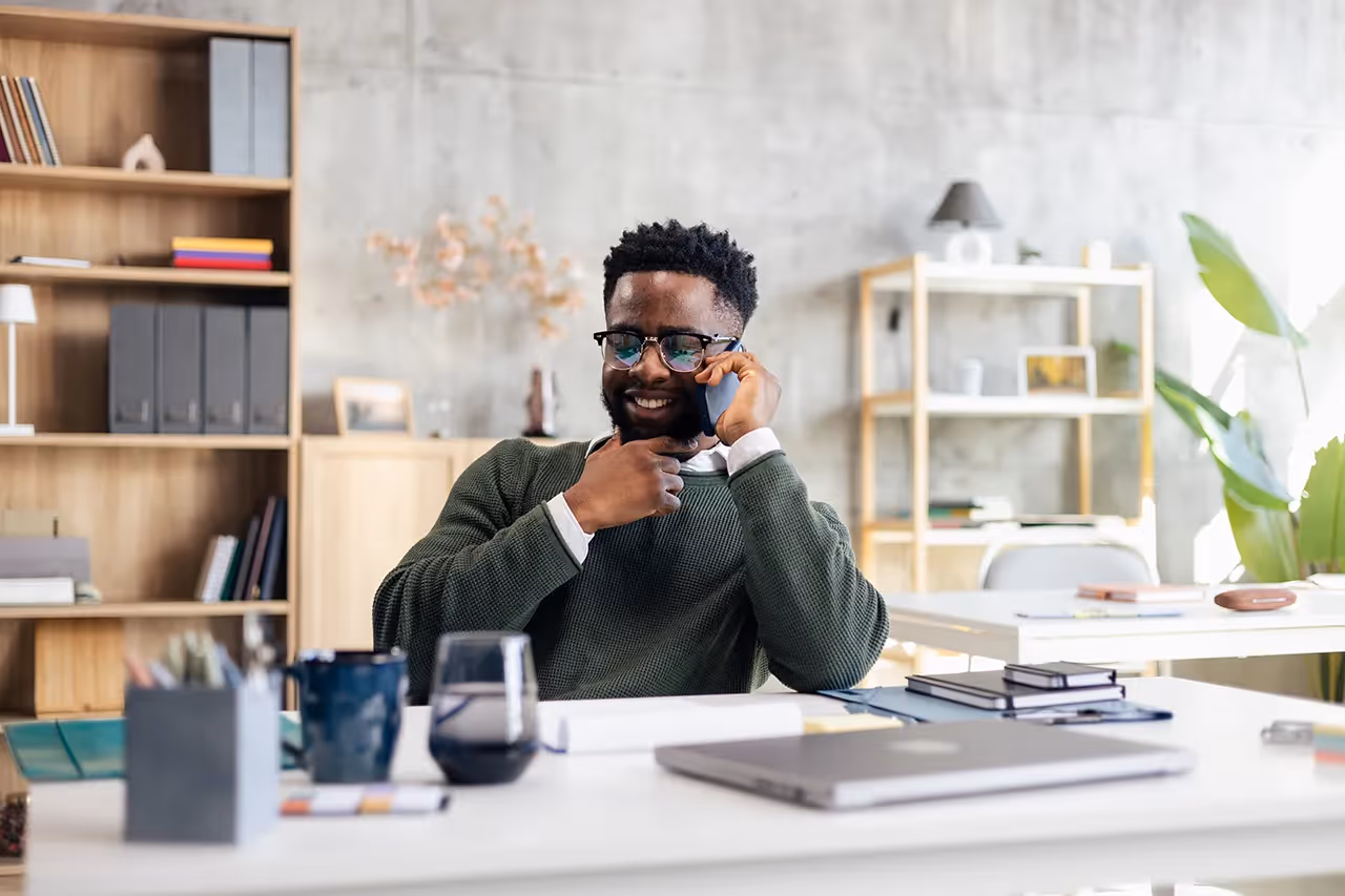 Man on the phone getting product info from AI agent