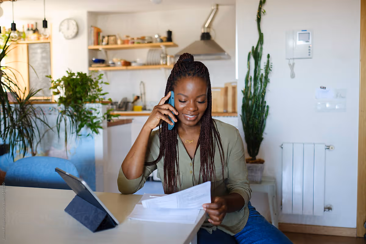 Couple shaking hands with financial advisor