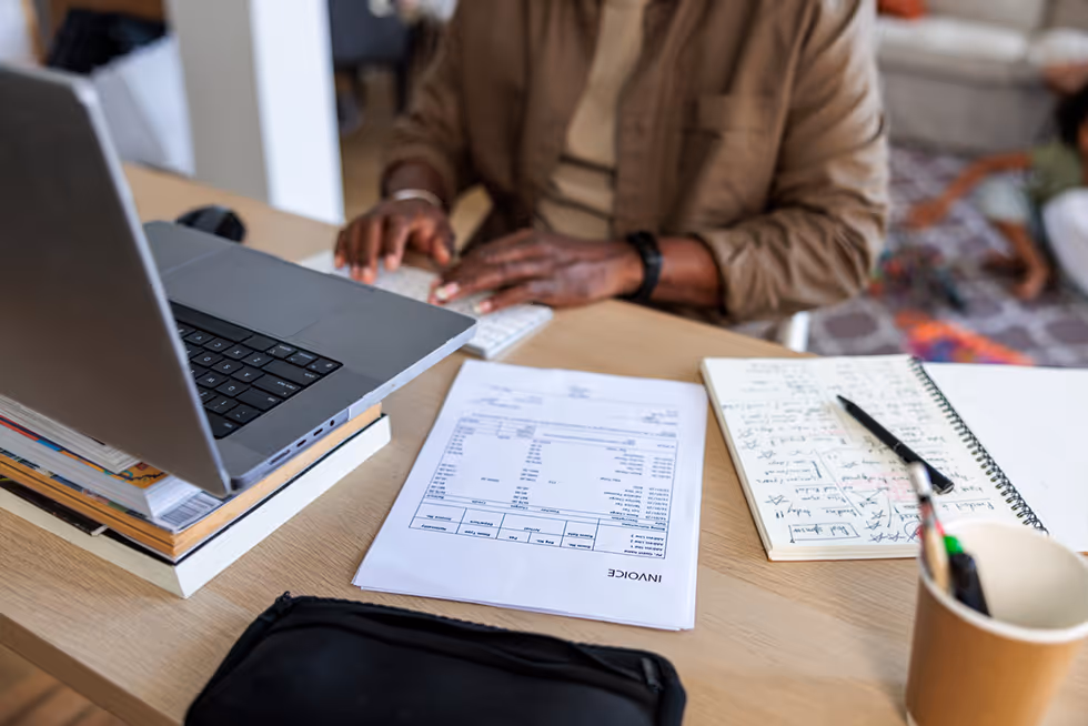 Couple shaking hands with financial advisor