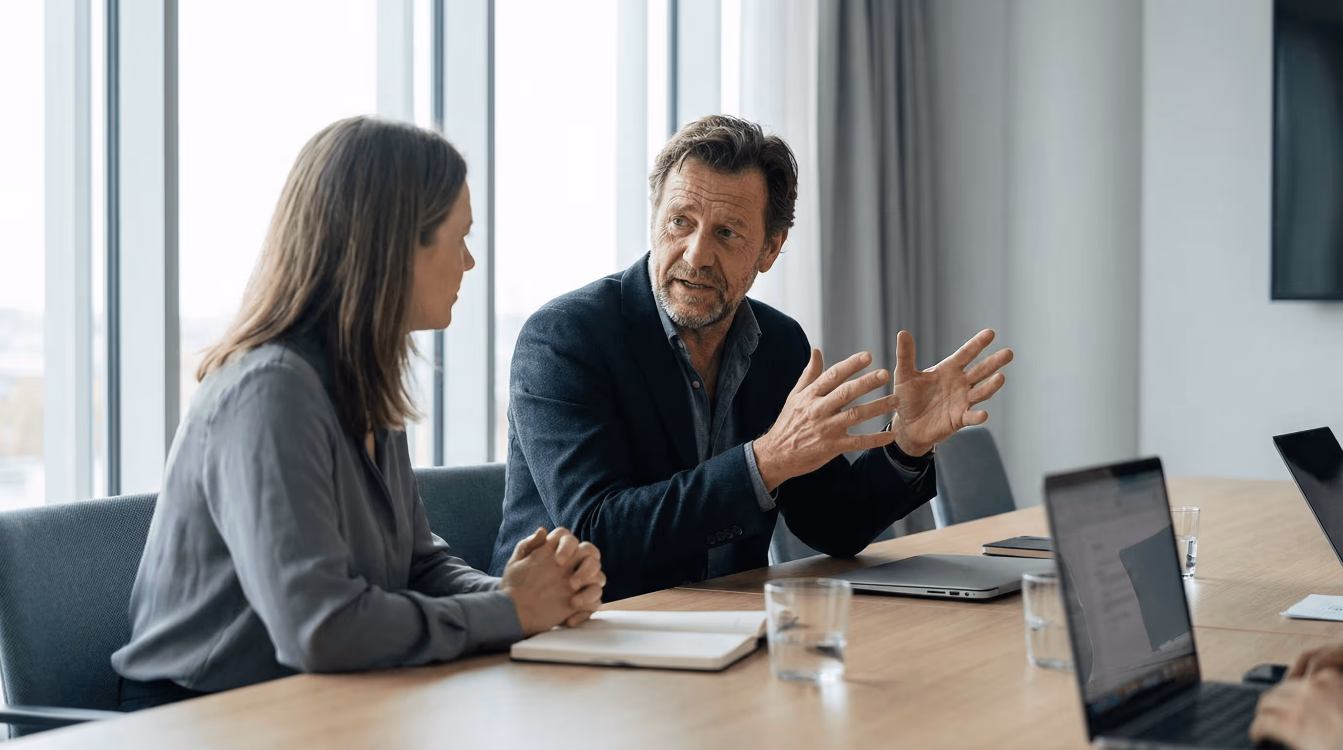 Business consultants discussing strategy during a meeting