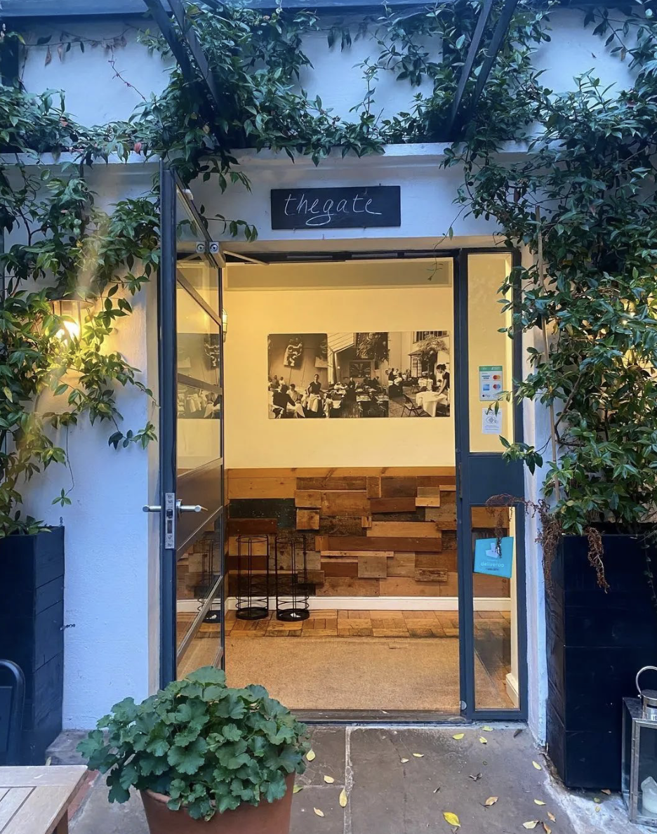 A photo of the entrance of the vegan restaurant The Gate in hammersmith. 