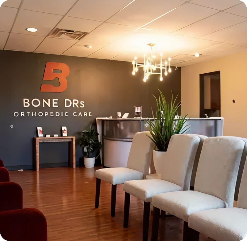 A bunch of chairs that are in a room.