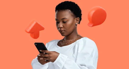 A woman holding a phone while checking Reddit.