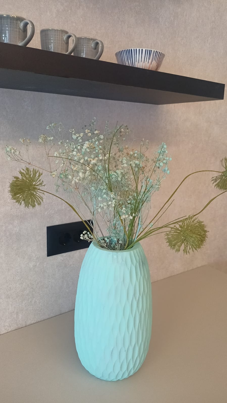 vase with flowers in living room