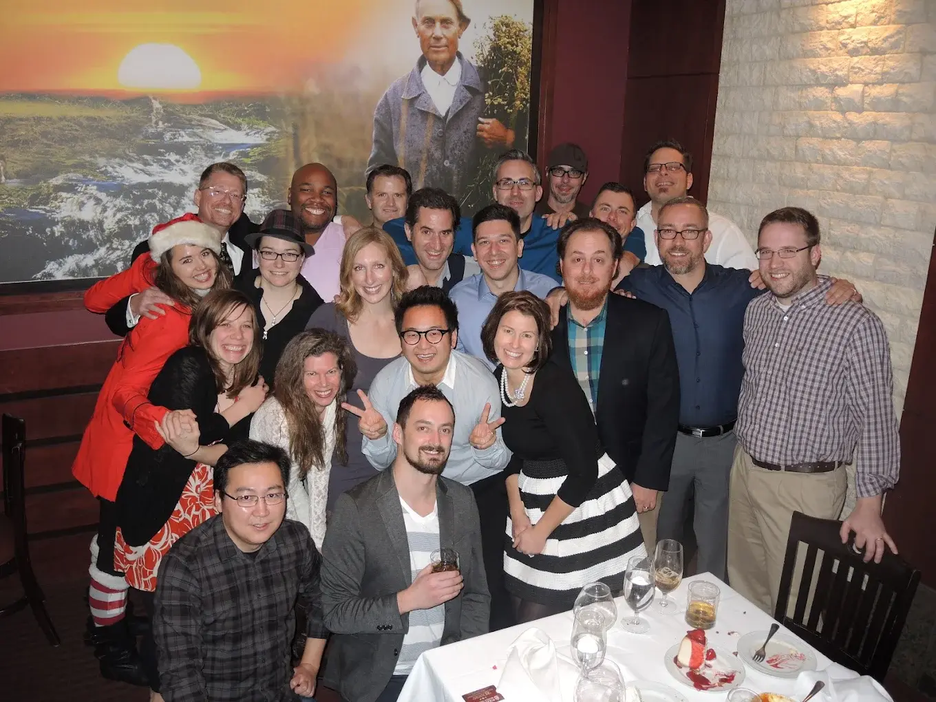 A growing 303 Software team celebrating a milestone during the company’s expansion, representing the people behind its early success in custom software development