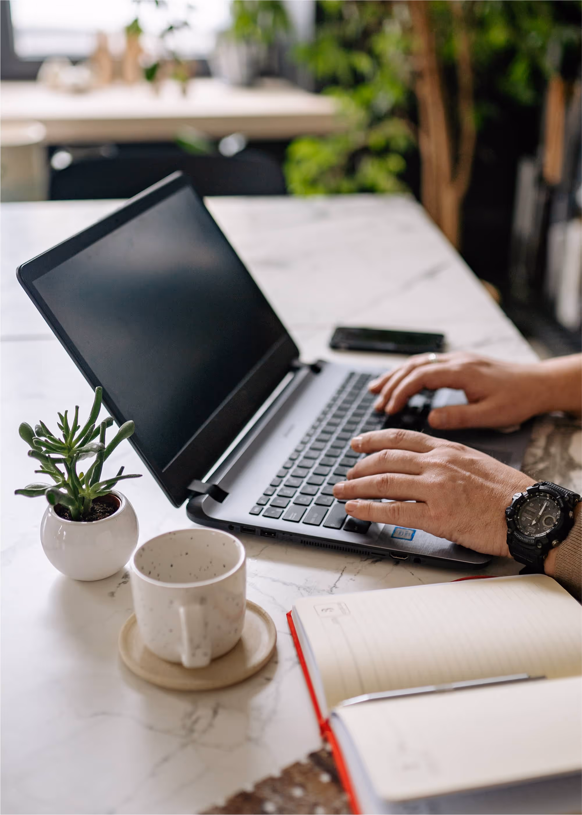 Focused work on a laptop in a calm environment, the result of changing workplace conditions for the better.