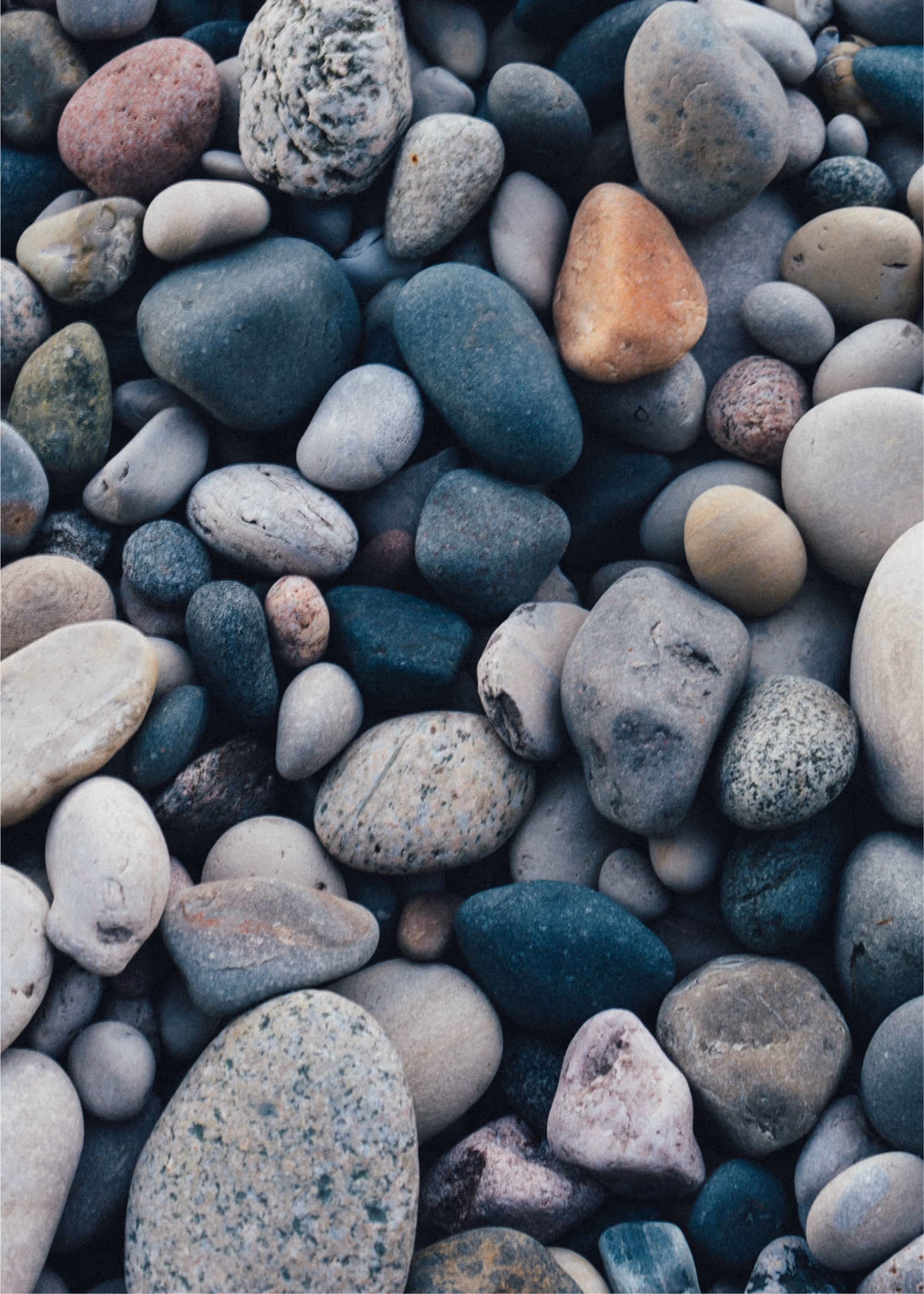 Smooth, balanced stones representing the solid foundation needed to change corporate culture.