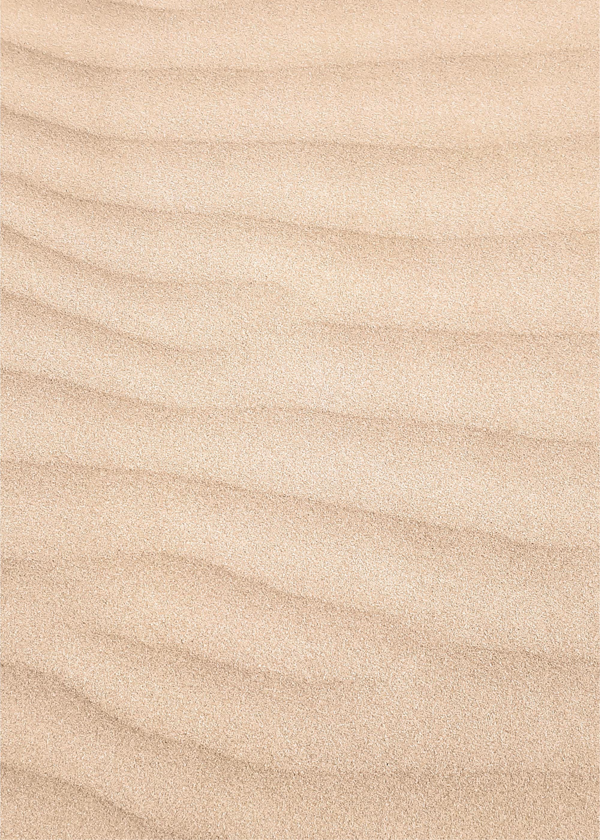 Gentle ripples in sand, symbolizing the small shifts in conditions that transform company culture.