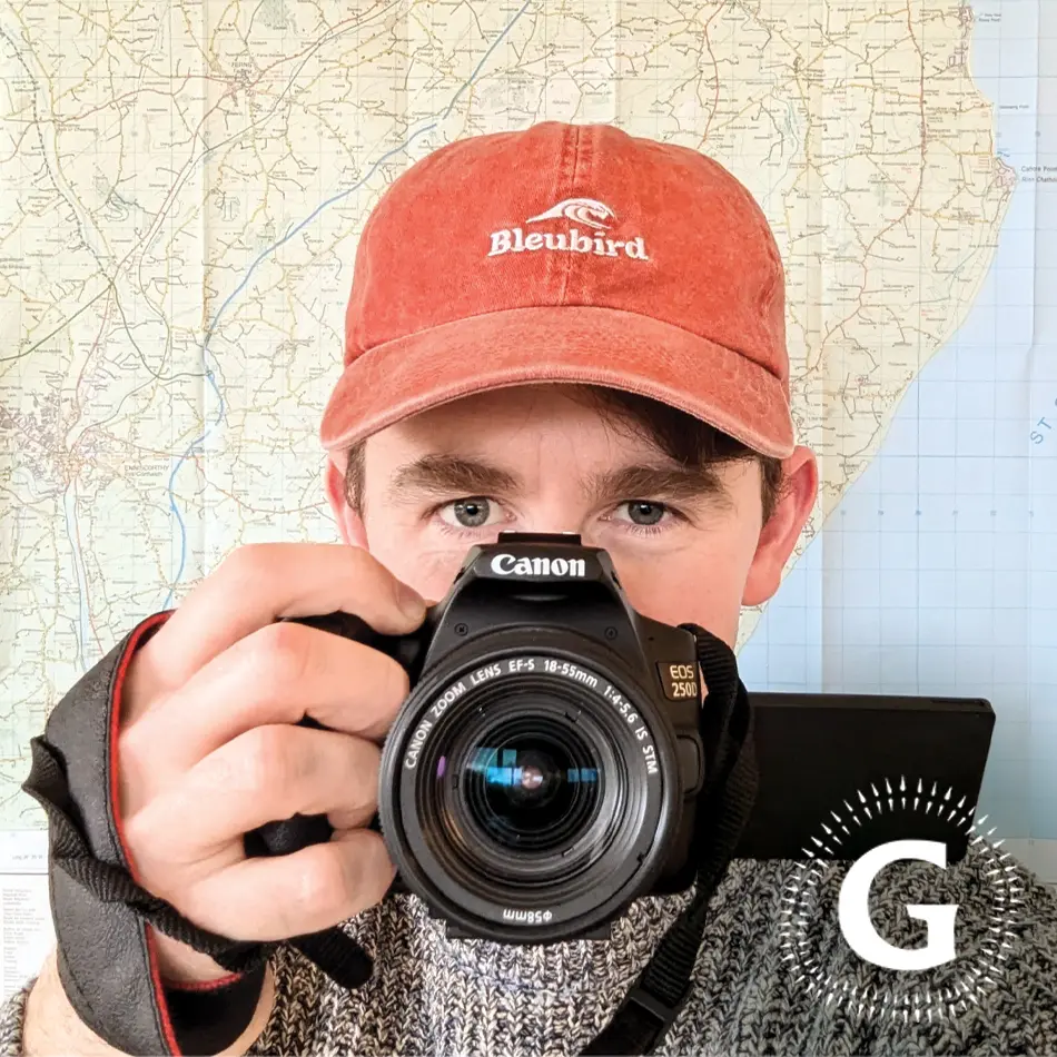 Kris Devlin of Grianán Media holding a camera 
